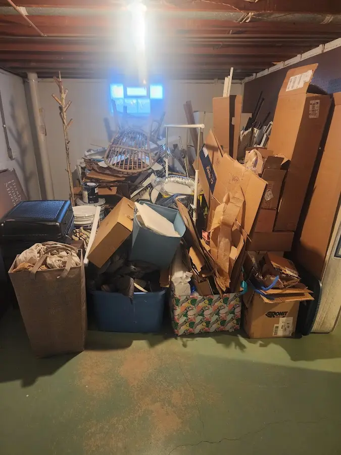 Roll-off dumpster container at job site for Construction Dumpster Rental in Cedar Creek